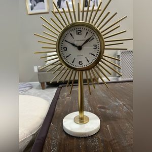 Bronze clock with marbled base